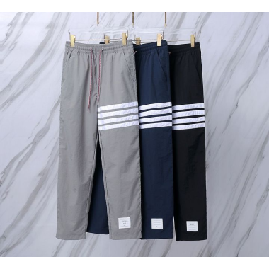 THOM BROWNE 톰브라운 042 사선 테크니컬 나일론 트랙 팬츠